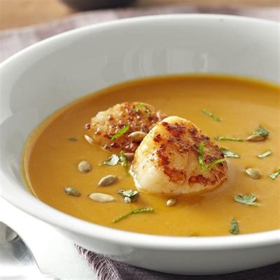  Spicy Scallop Soup: Un viaggio piccante verso il mare con un brodo avvolgente!